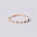 Pulsera de Piedra Luna Adularia natural en tonos claros (blanco lechoso, crema y melocotón suave) con brillo sedoso. Piedra de la intuición femenina.