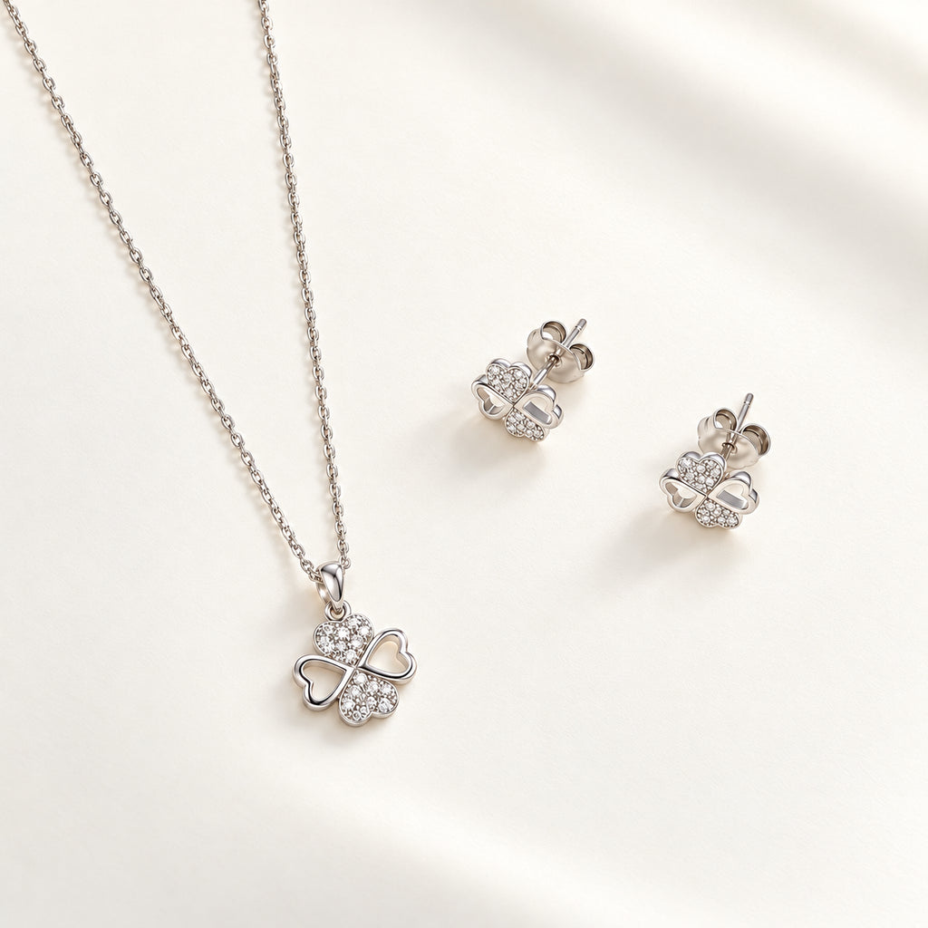 conjunto de colgante y pendientes de trébol de 4 hojas en plata 925 con circonitas