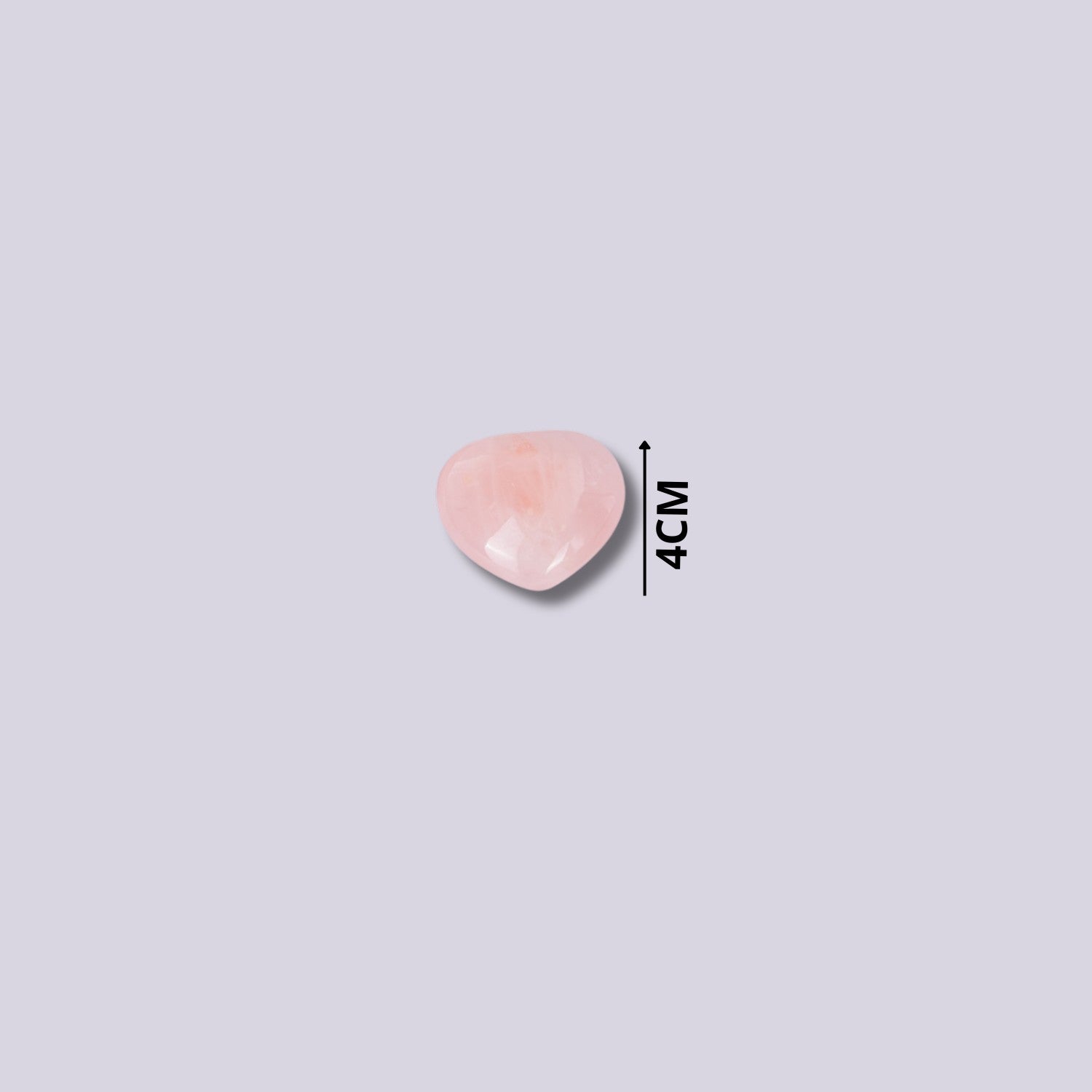 Piedra natural de Cuarzo Rosa tallada en forma de corazón de 4cm. Acabado pulido brillante y tono rosado suave.