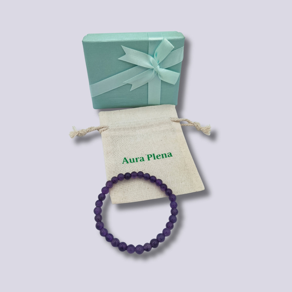 Pulsera de amatista natural con packaging Aura Plena